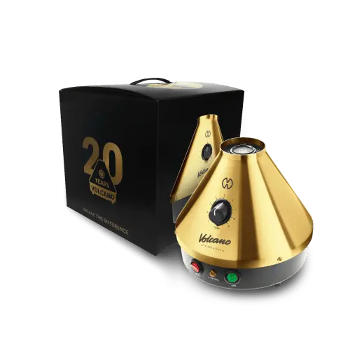 Volcano Classic Vaporizer *Gold Edition* Vaolcano Classi Vaporizer in der Gold Edition neben seiner in Schwarz Gold gehaltener Verpackung mit Tragegriff